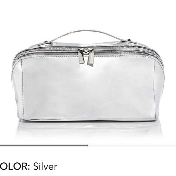 NEW. LANCÔME GUERLAIN ELIZABETH ARDEN cremes and 2 makeup pouches. All new. - Picture 9 of 12